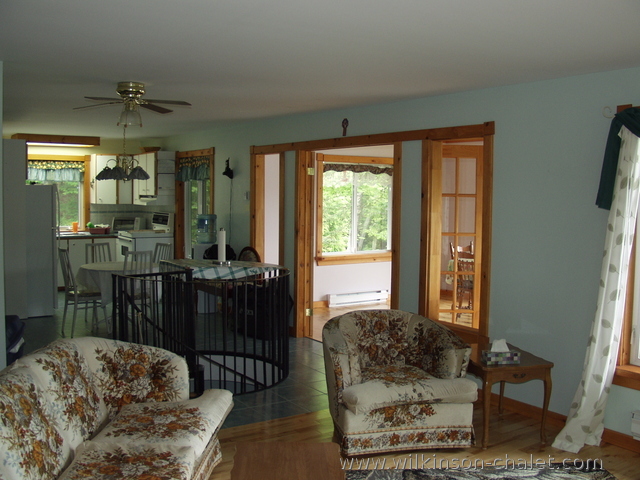 Cottage family room looking toward the kitchen,
       Bouchette, Quebec