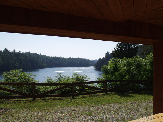View from the cottage covered patio during the Summer,
       overlooking Malone Bay,
       Lac des trente et un milles,
       Bouchette, Quebec