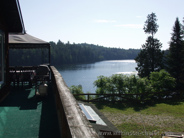 View of Malone Bay from the cottage deck looking East during the Summer,
       Lac des trente et un milles (31 miles lake),
       Bouchette, Quebec